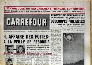 La une du n° 525 de Carrefour  ce jour-là, titrant Savants et Etats-Majors se saisissent du    problème des soucoupes volantes... tandis que l'U.R.S.S. se déclare pr ête à envoyer une fusée dans la Lune !